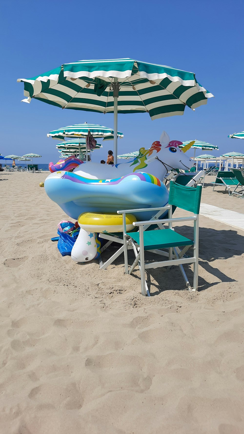 a beach chair and umbrella