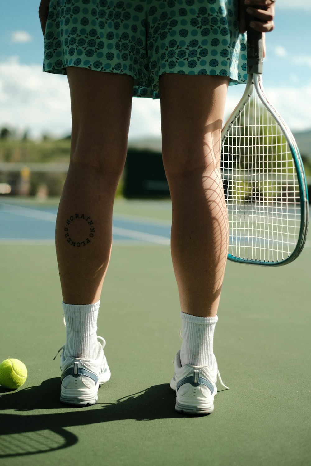 a person holding a tennis racket