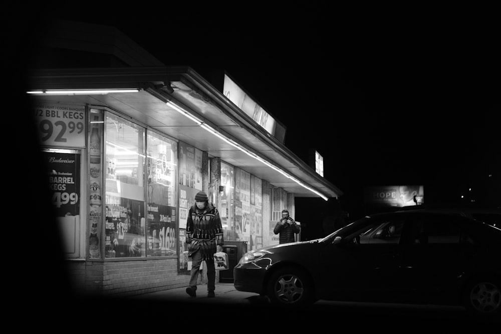 a person standing outside a store