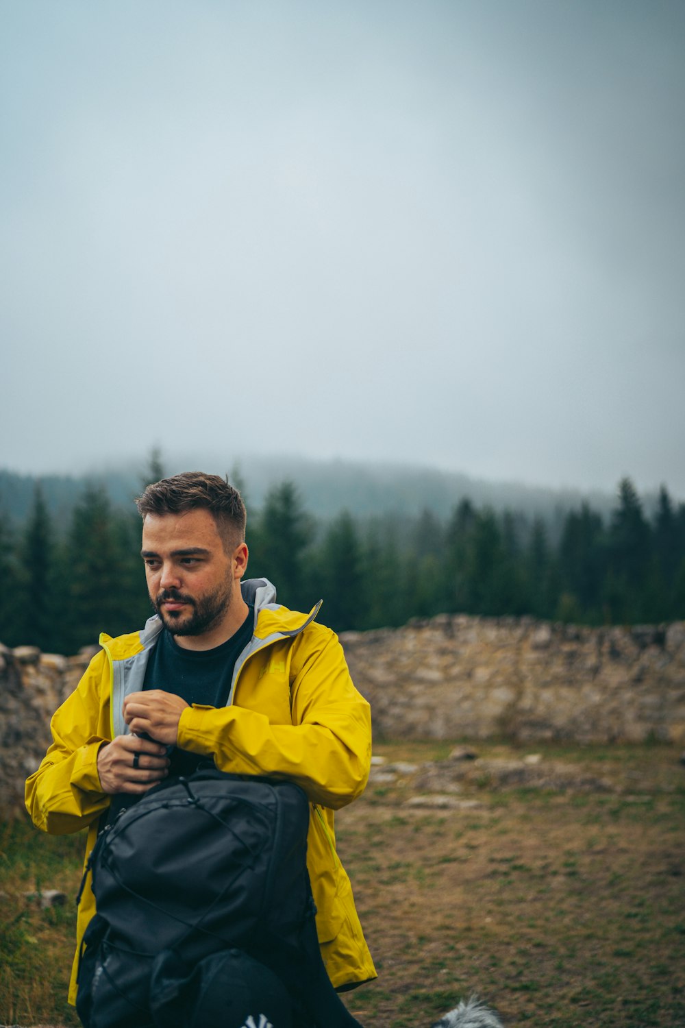 a man holding a bottle of beer