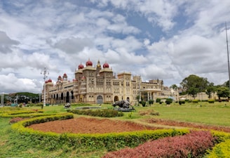 The royal family avatars posing together in front of the grand palace setting inside the game.