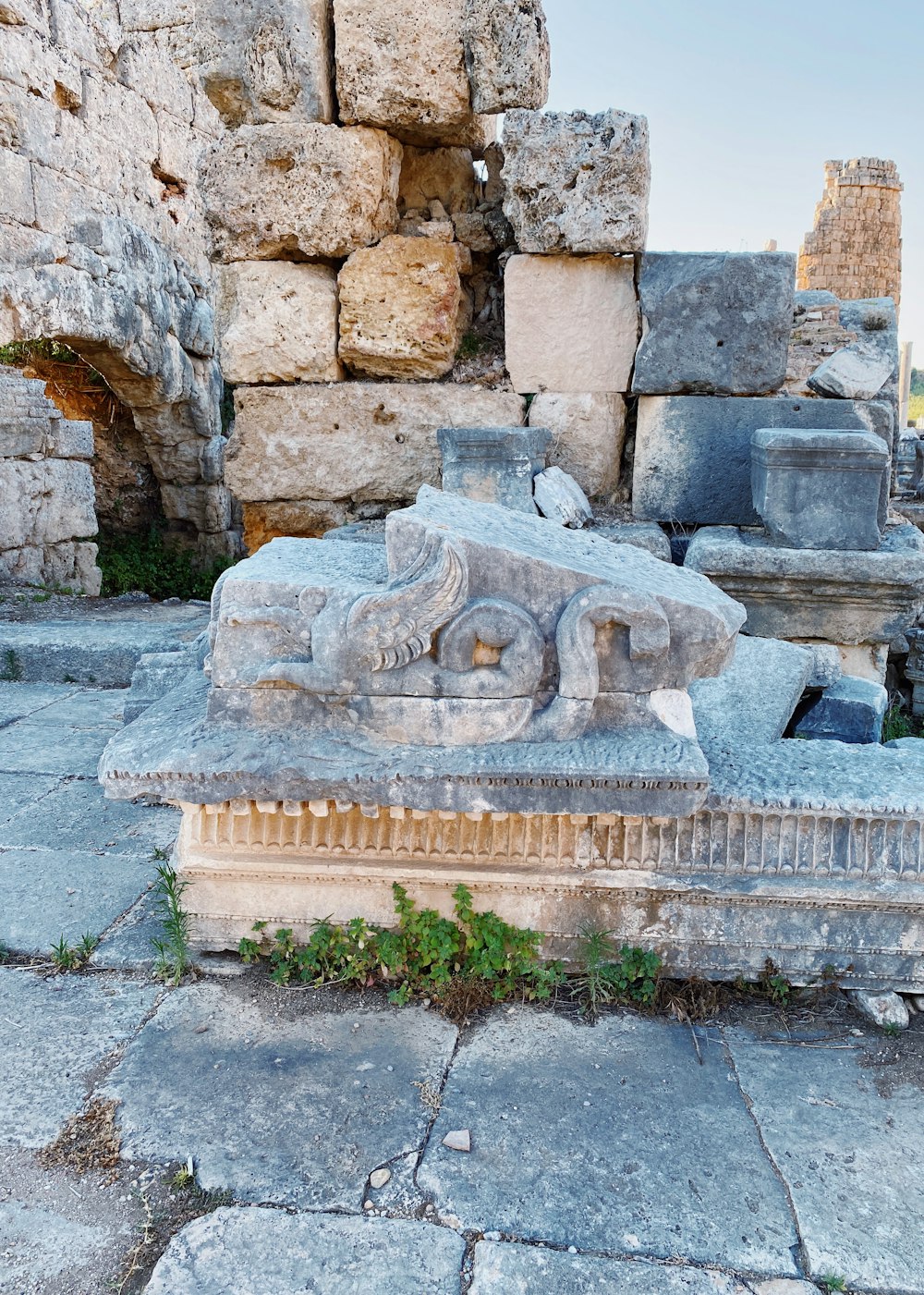 a stone structure with a stone wall