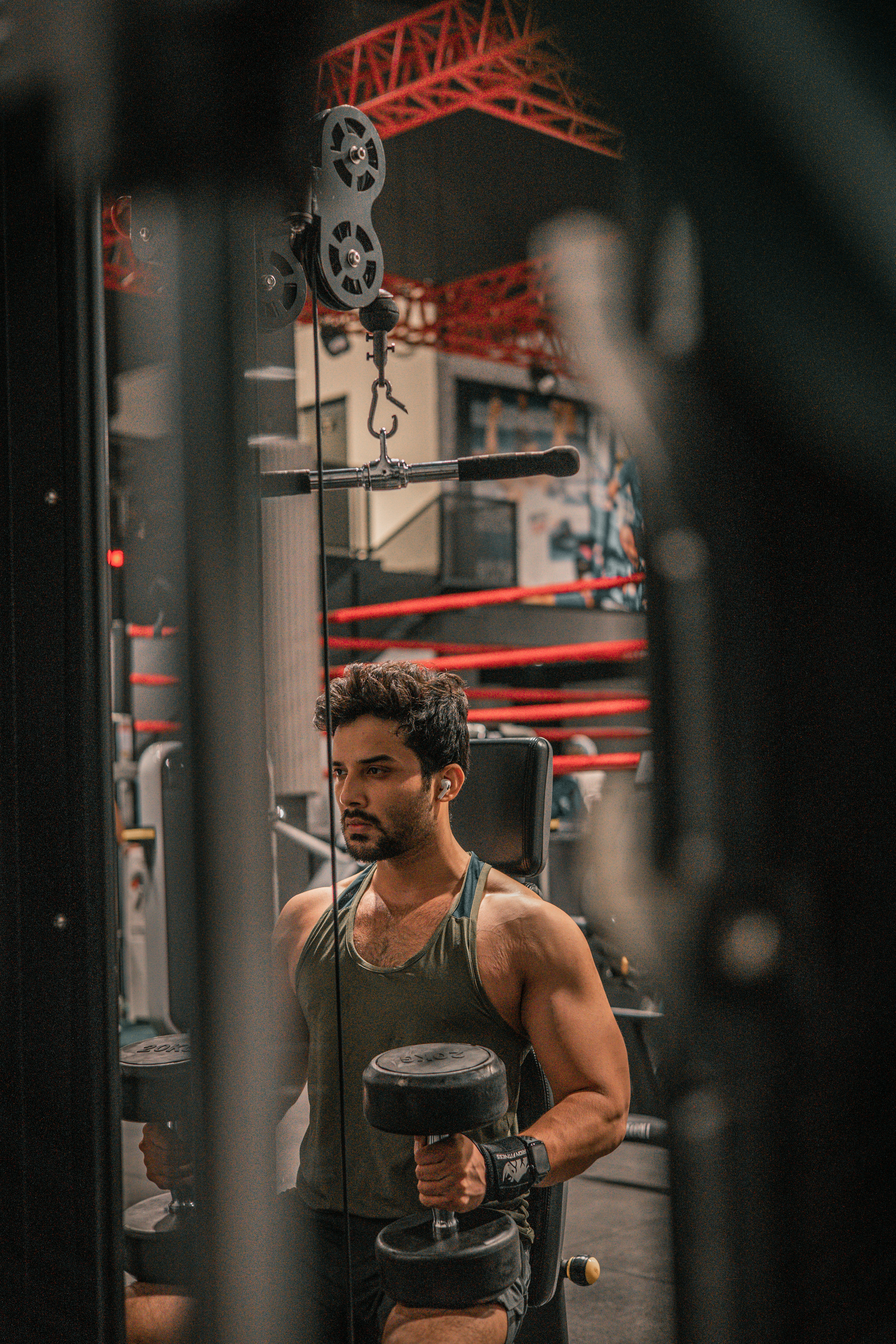 a man holding a glass of liquid