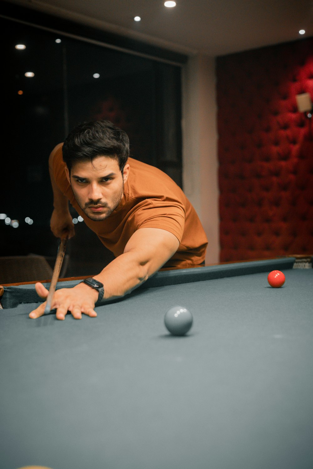 a man playing pool