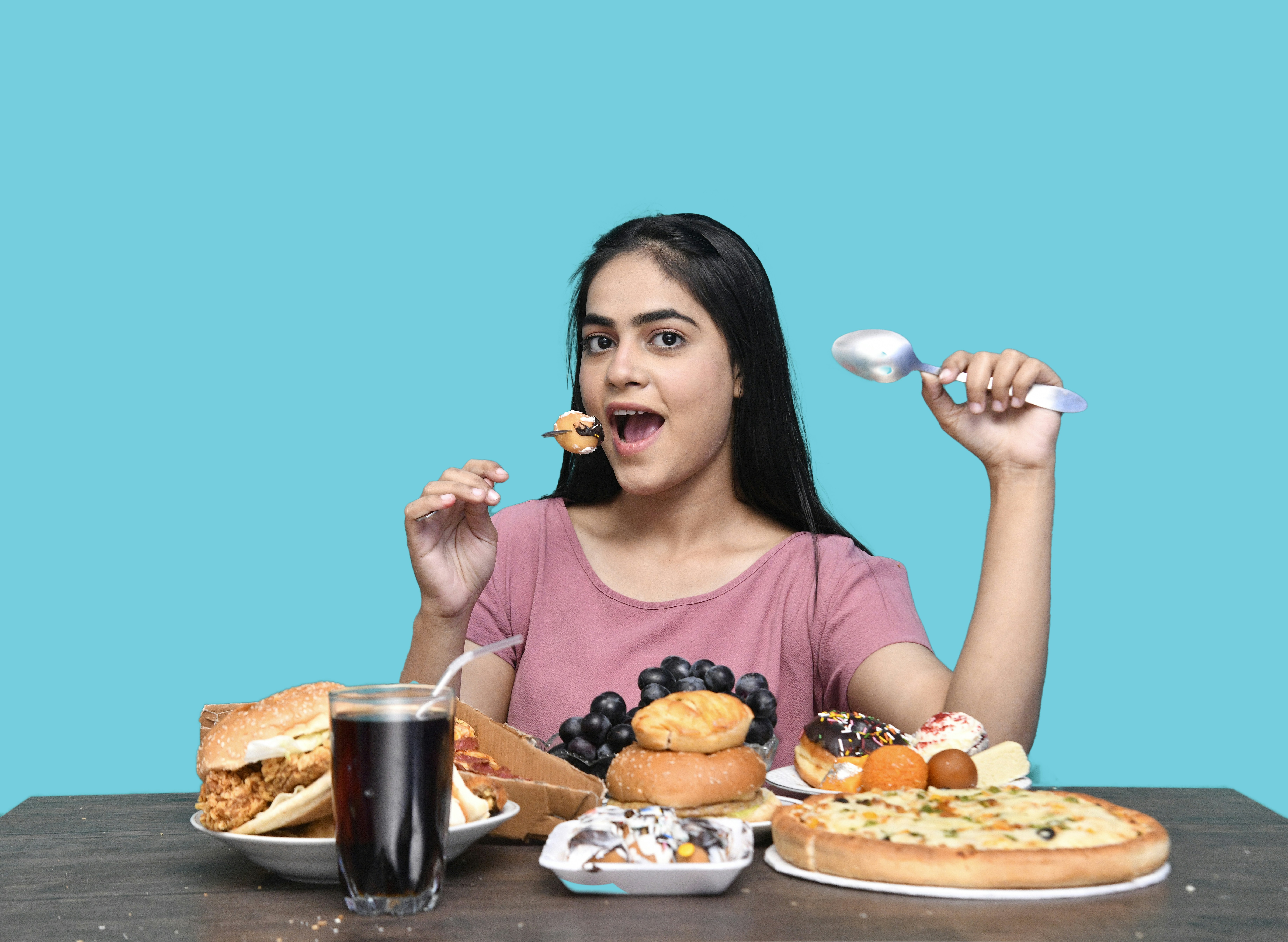 a woman eating a sandwich