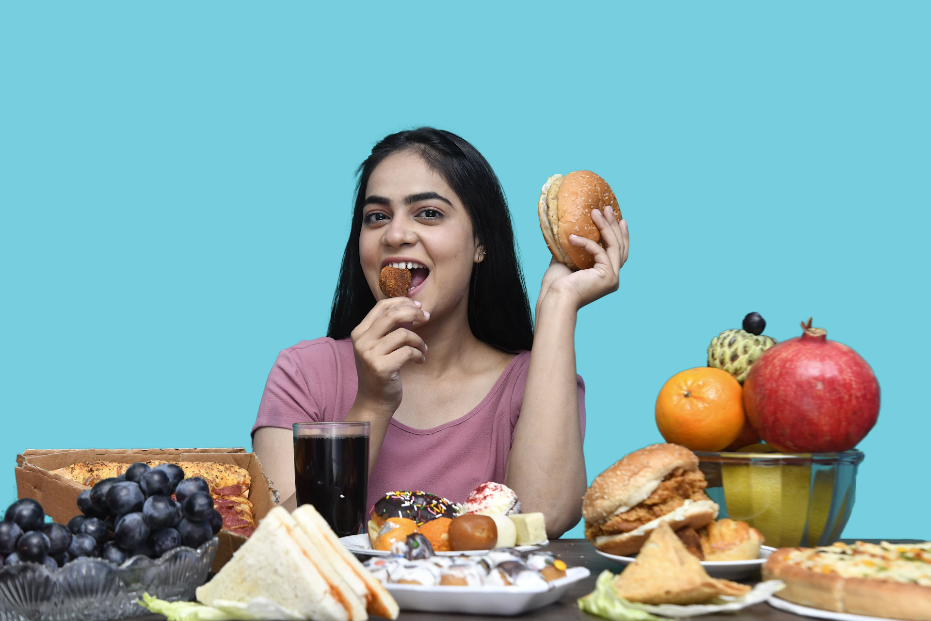 a woman eating a sandwich