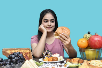 a woman eating a sandwich