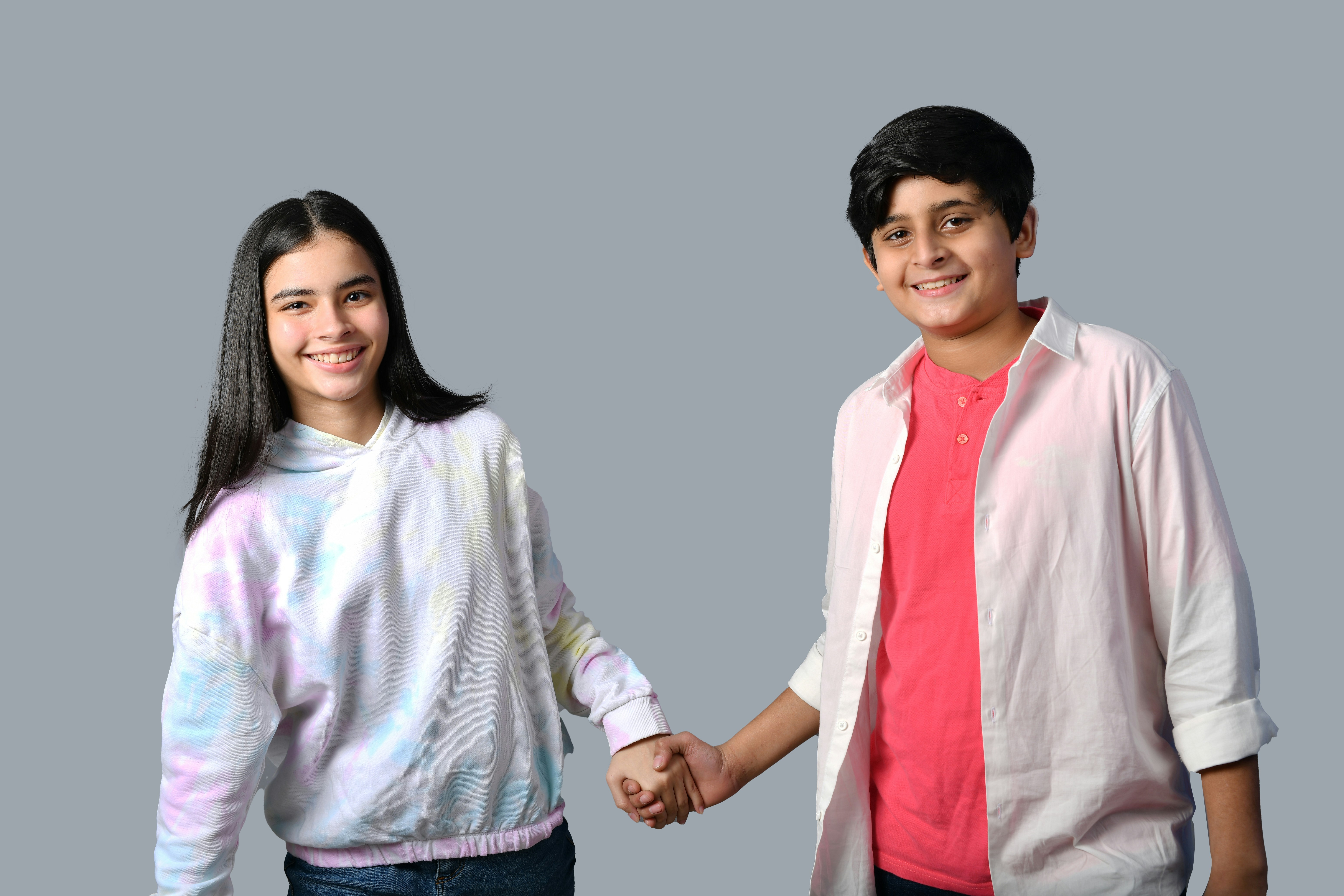a man and a woman smiling