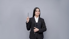 a person holding a pen