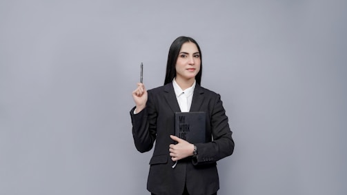a person holding a pen