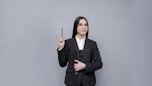 a person holding a pen