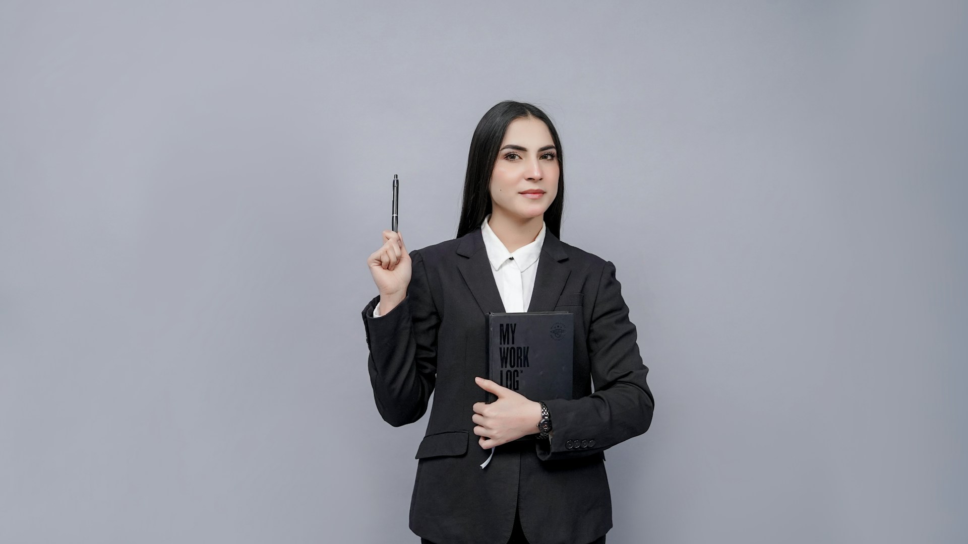 a person holding a pen