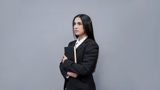a person holding a laptop