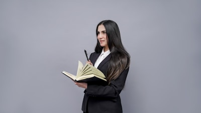 a woman holding a book