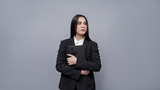 a person holding a laptop