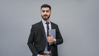 a man holding a book