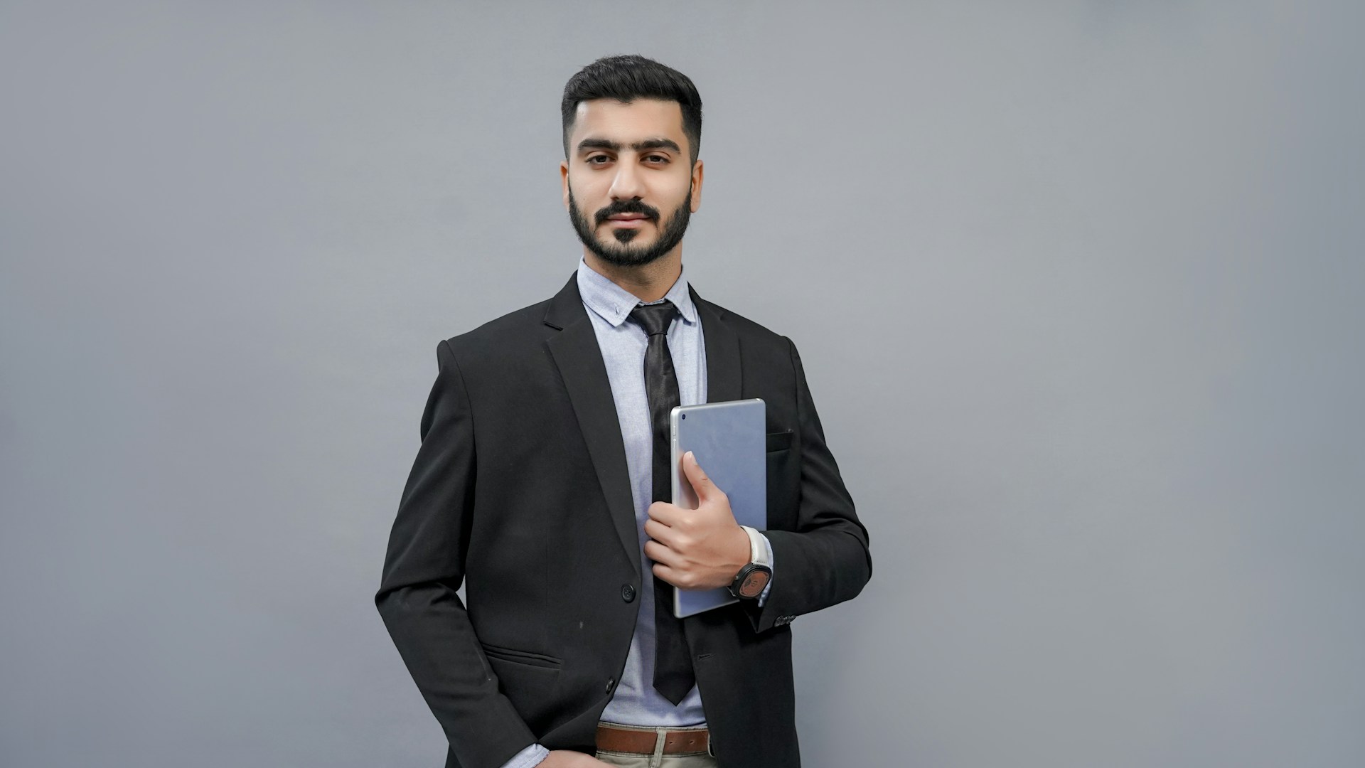 a man holding a book
