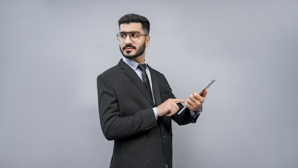 a man holding a pen