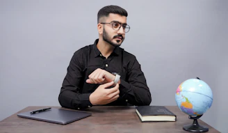 a man sitting at a desk
