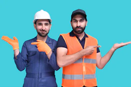 two men wearing safety vests