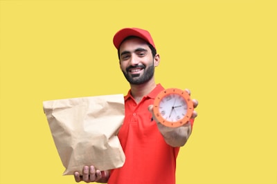 a person holding a clock