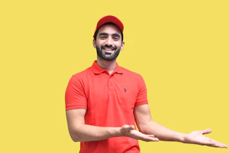 a man wearing a red hat
