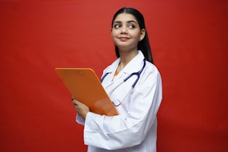 a person holding a laptop