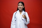 a doctor with a stethoscope around her neck
