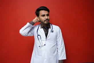 a man with his hand on his head