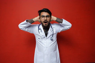 a man wearing a white lab coat