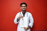 a man holding a piece of paper