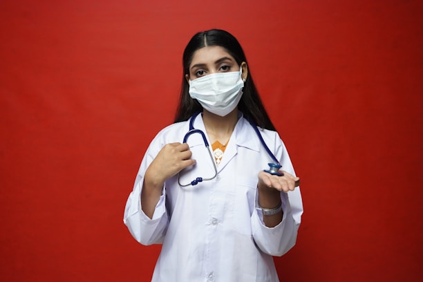 a doctor with a stethoscope around her neck