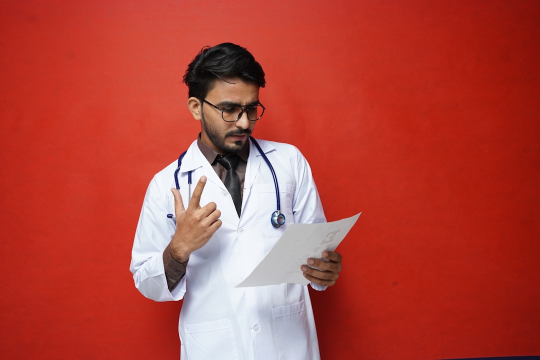 doctor filling out form - medically essential electric service doctor filling out form - medically essential electric service