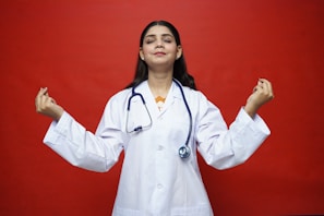 a doctor with her hands up
