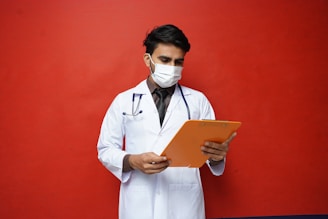 a doctor holding a tablet