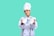a young boy wearing a chef's hat holding a plate