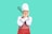 A satisfied customer wearing a Chef Esquidish apron in their kitchen.