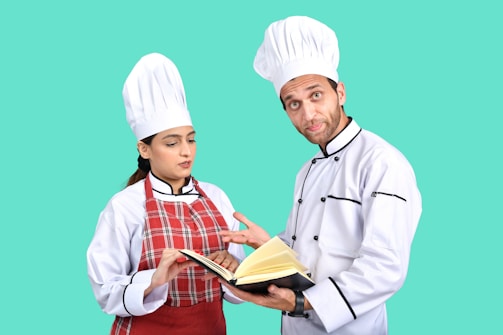 a man and a woman in chef outfits