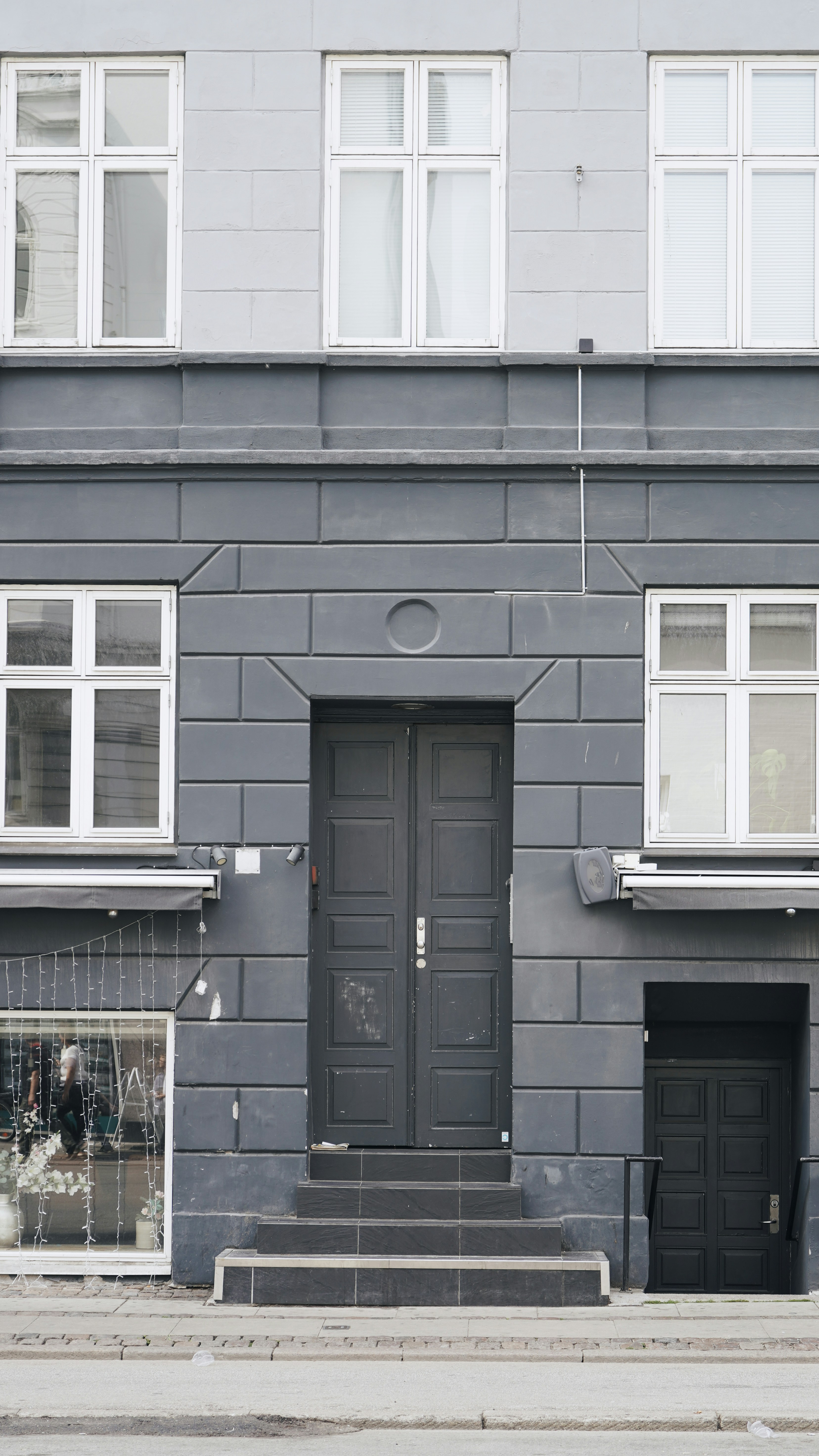 a building with black doors
