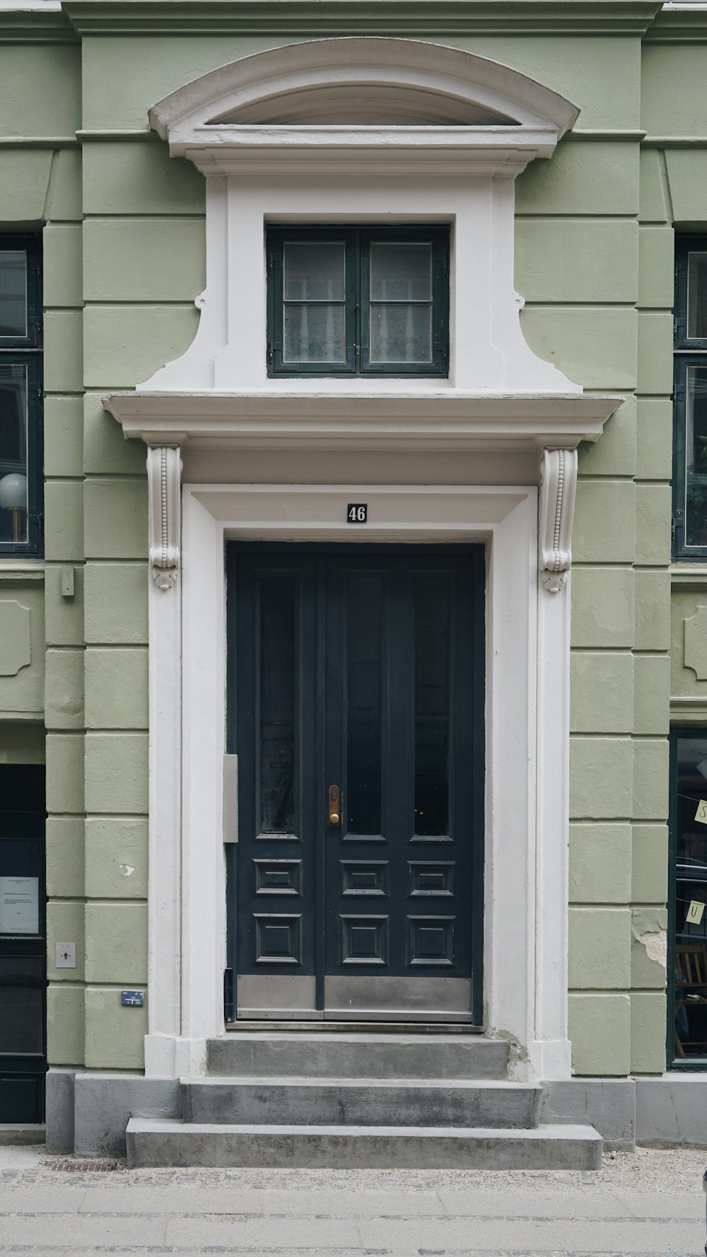 a building with a blue door