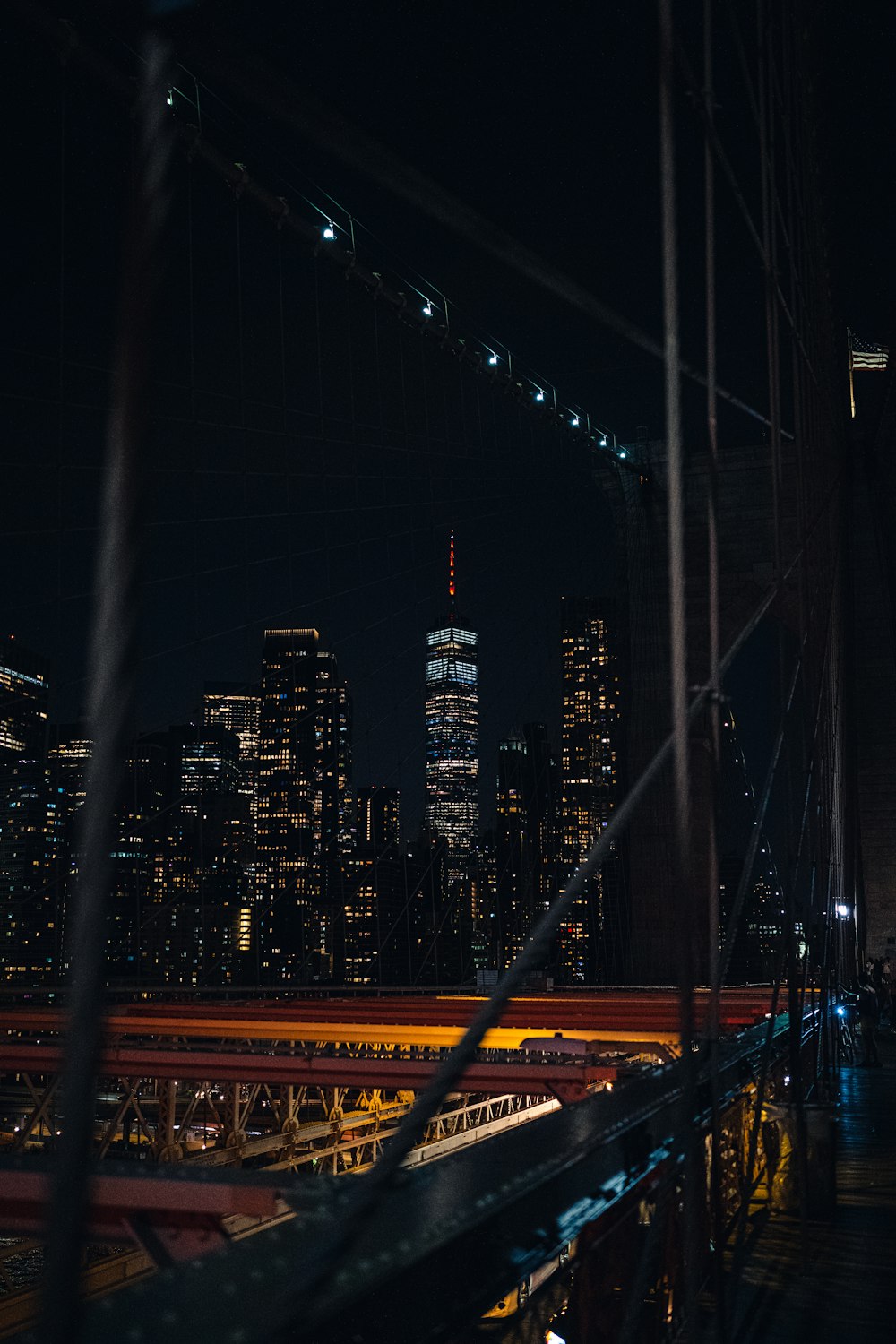 a bridge with a city in the background