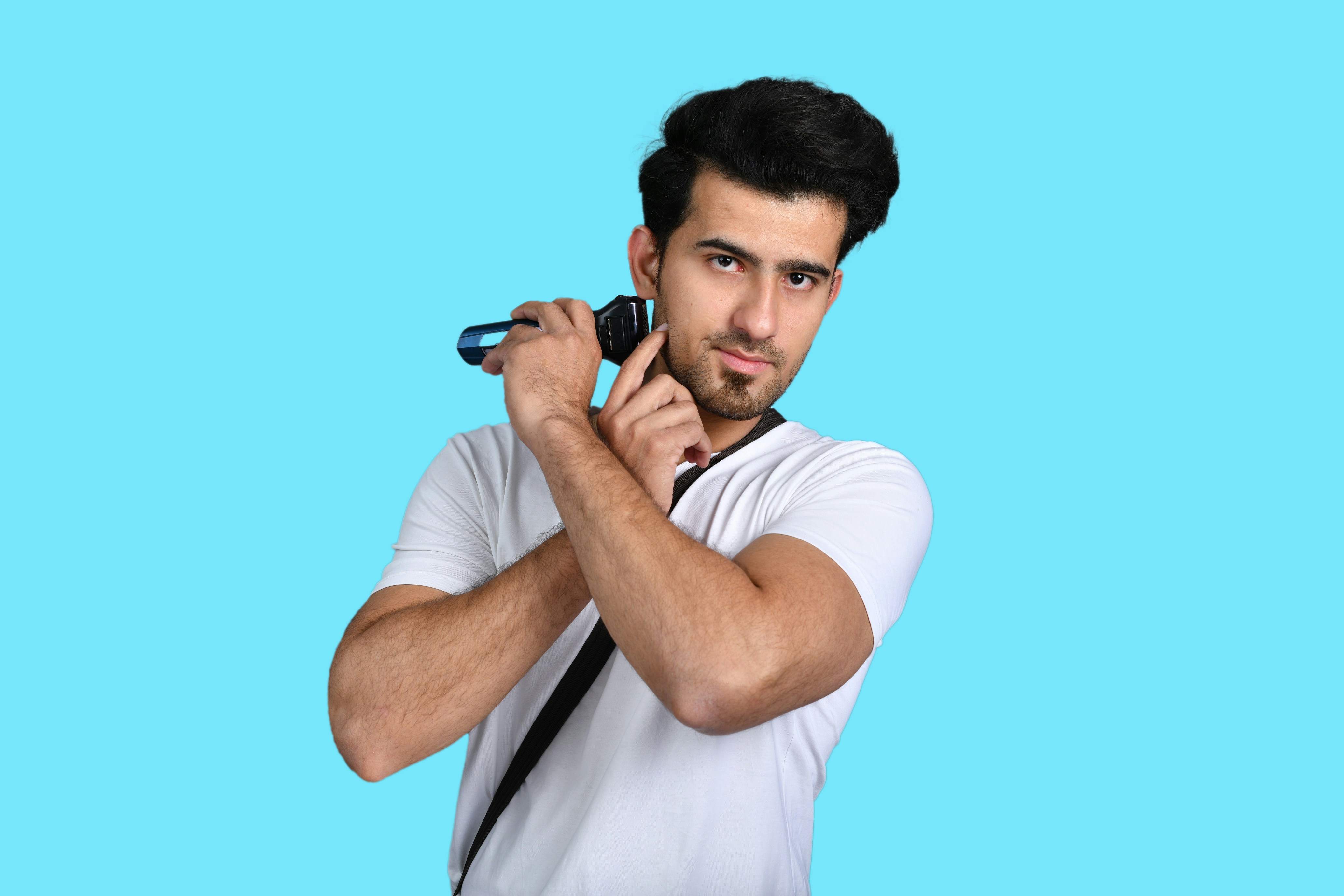 Body grooming routine using a trimmer