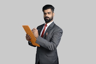 a man holding a book