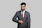 a man in a suit with his arms crossed