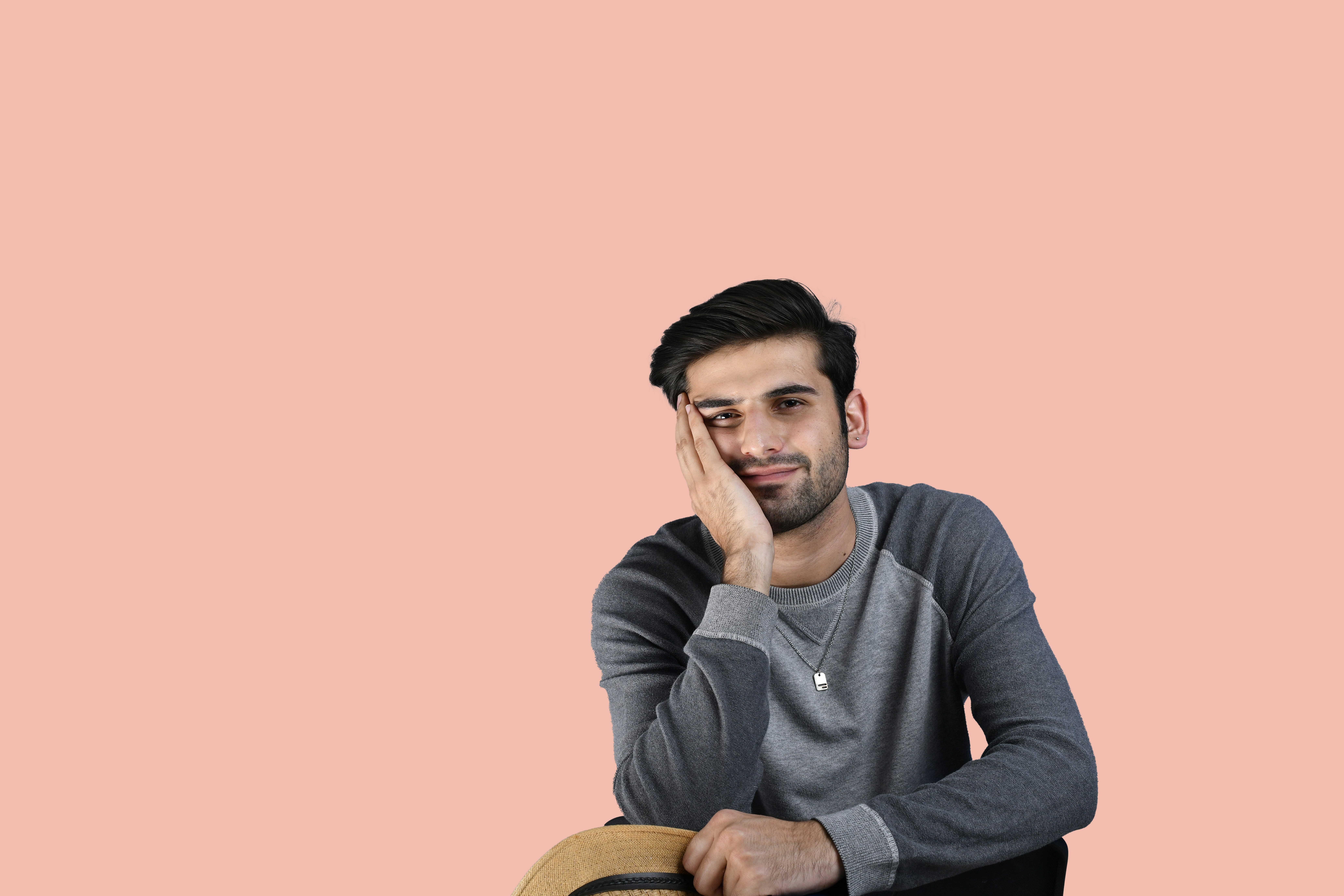 Digital artist creating a vibrant avatar with personality traits on a tablet