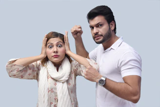 a man and a woman posing for a photo