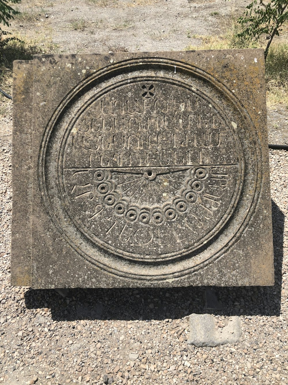 a stone with writing on it