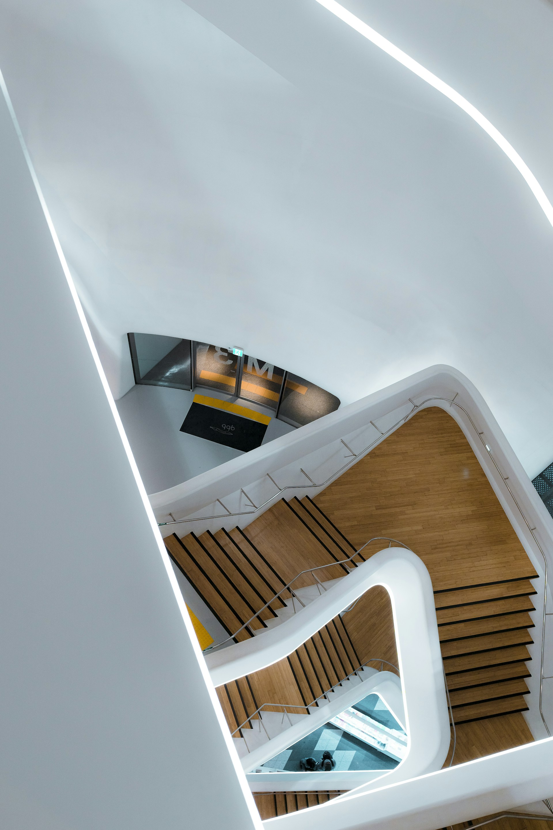 a spiral staircase with a light