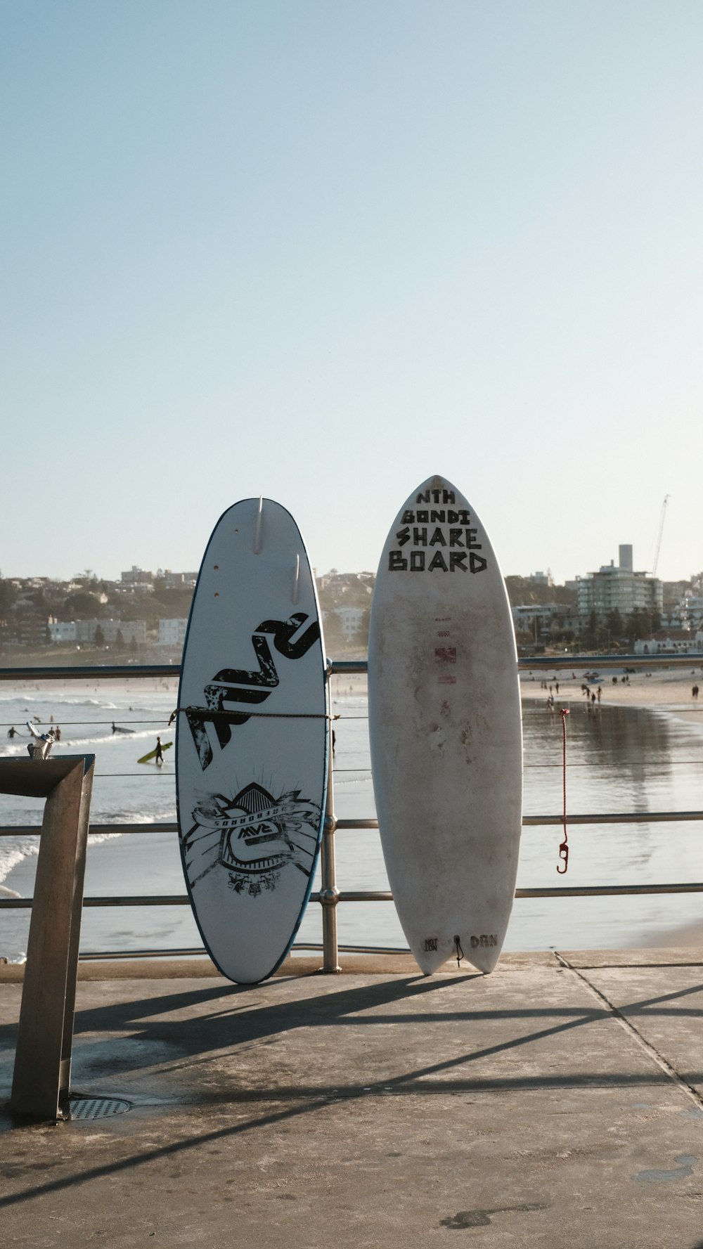 a couple of surfboards on a dock