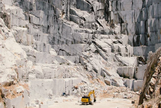 a construction vehicle in a rocky area